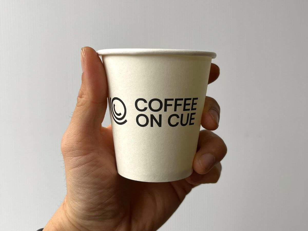 Coffee on Cue branded 6oz compostable coffee cup