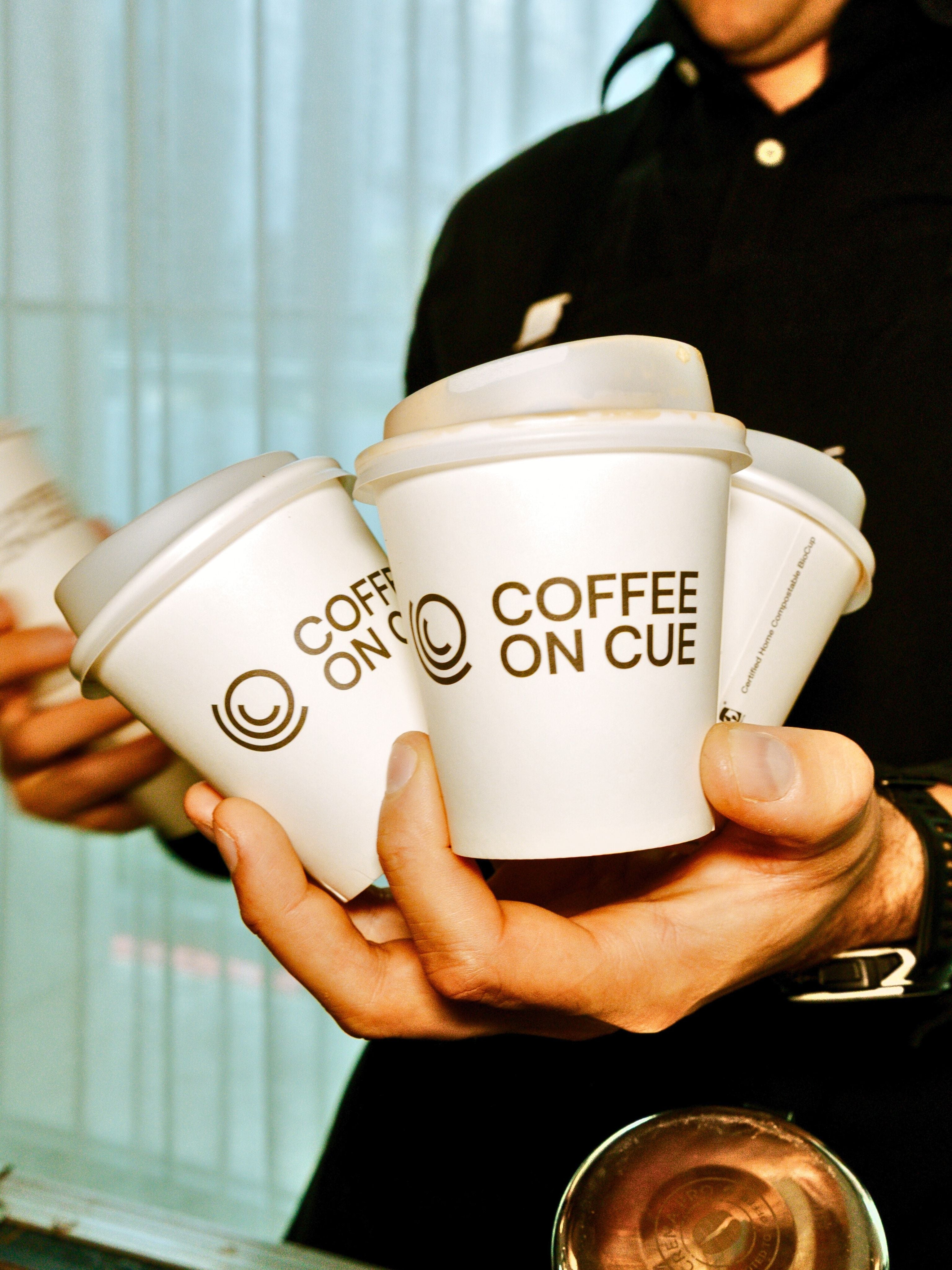 Coffee on Cue branded takeaway cups