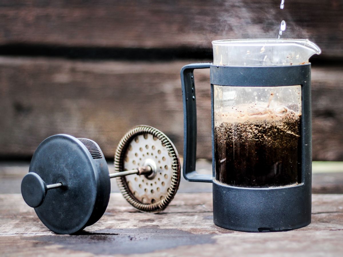French press with brewed coffee inside