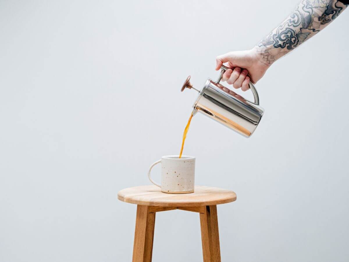 Coffee being poured from plunger