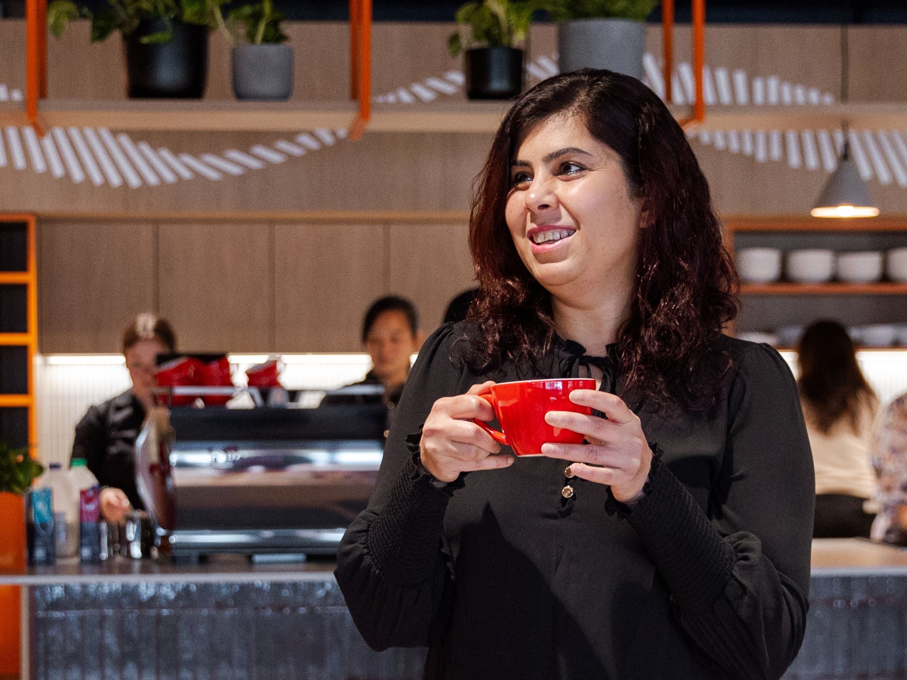 Workplace employee with their inside of office kitchenette
