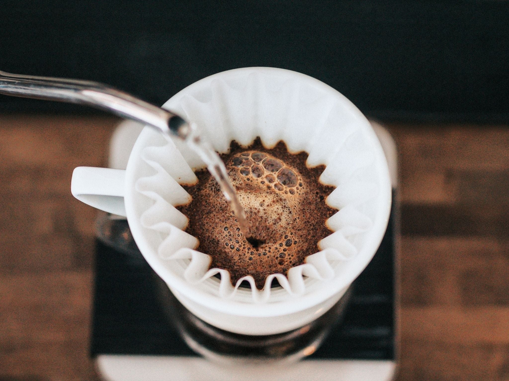 Filter coffee brewing into cup