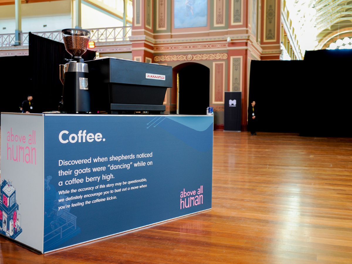 Fully branded custom coffee cart at conference event