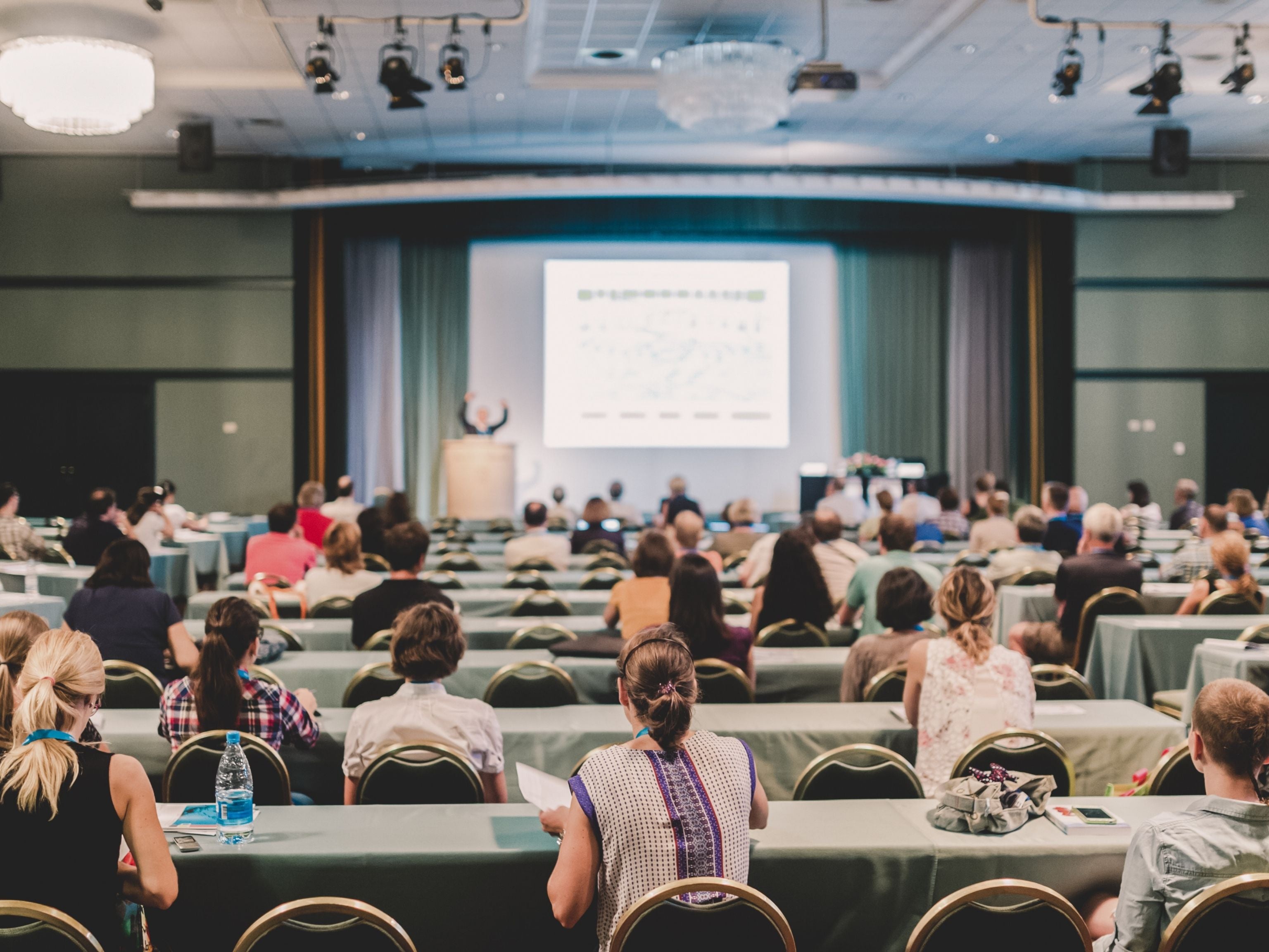 Conference guests in session