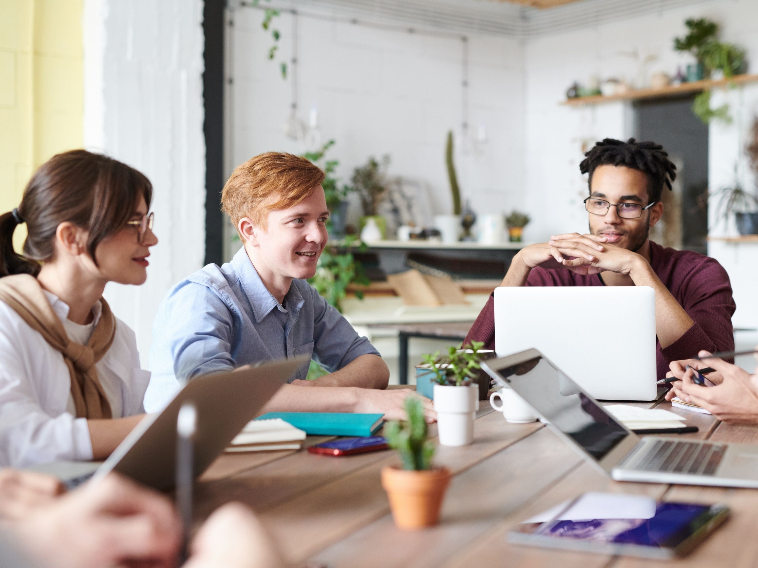 Employees collaborating together as a team