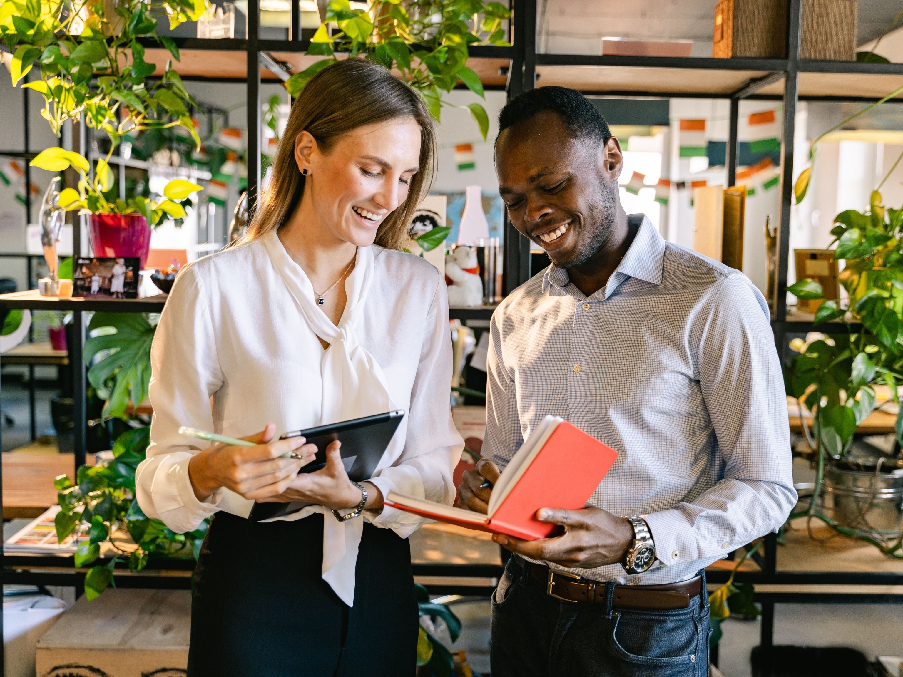 Employees at work reading a book