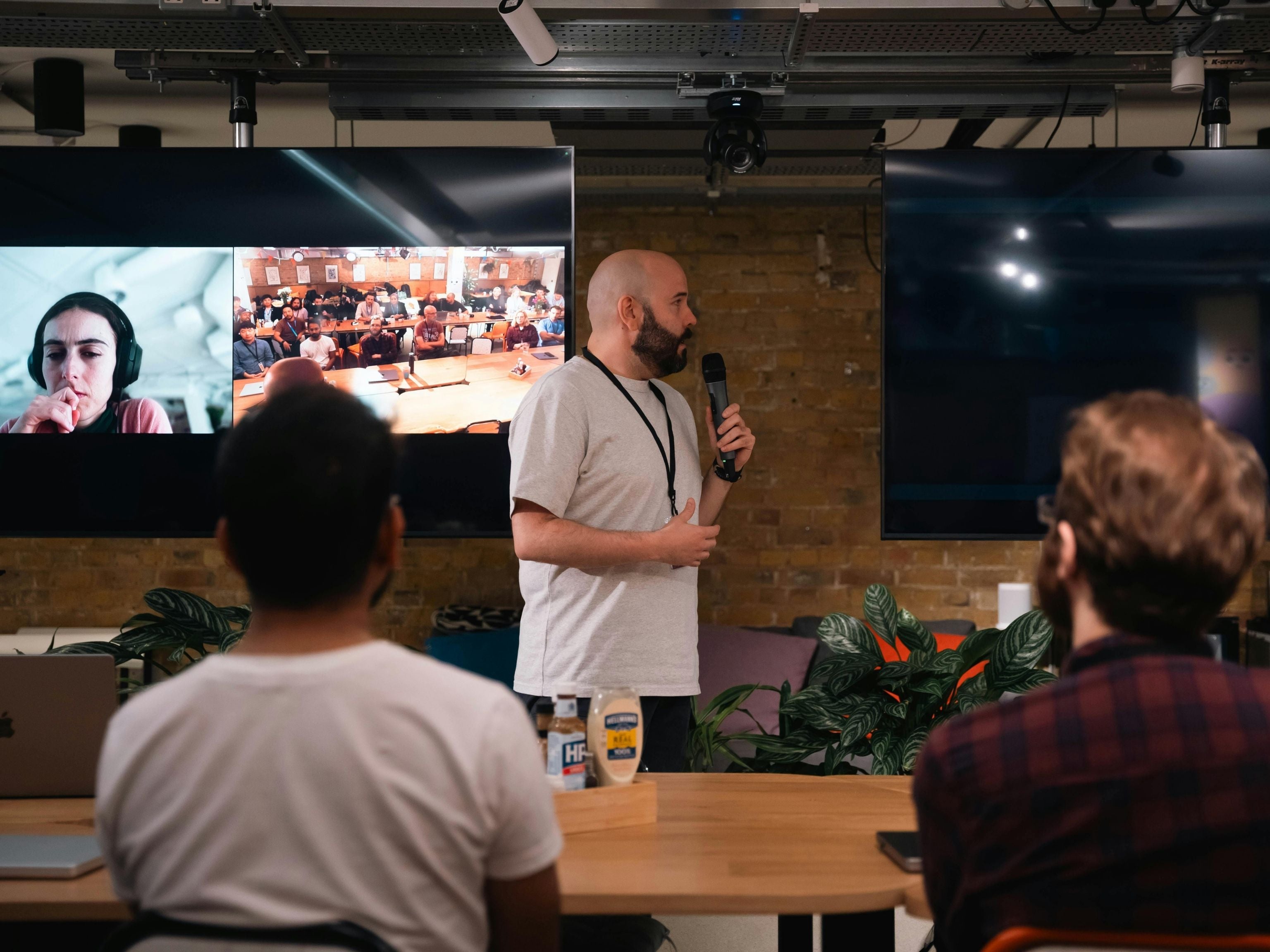 Key note speaker giving speech to event audience