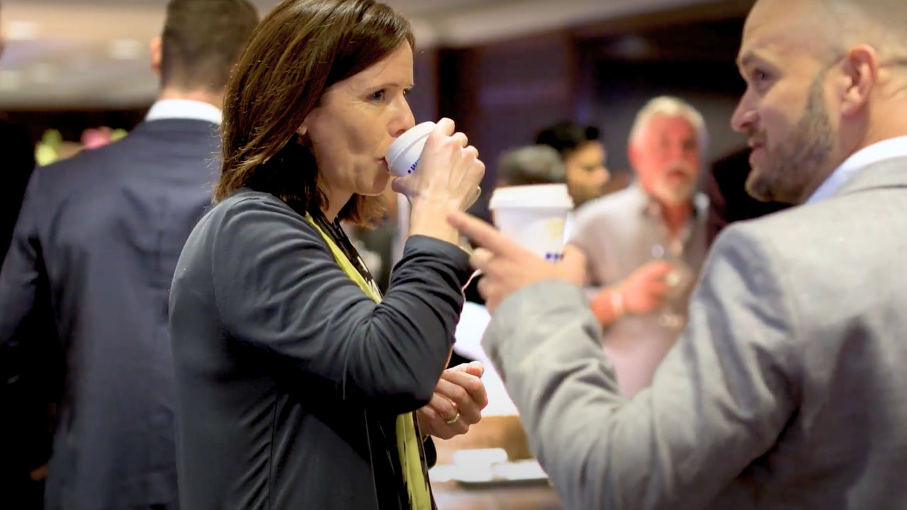 Conference delegates drinking coffee