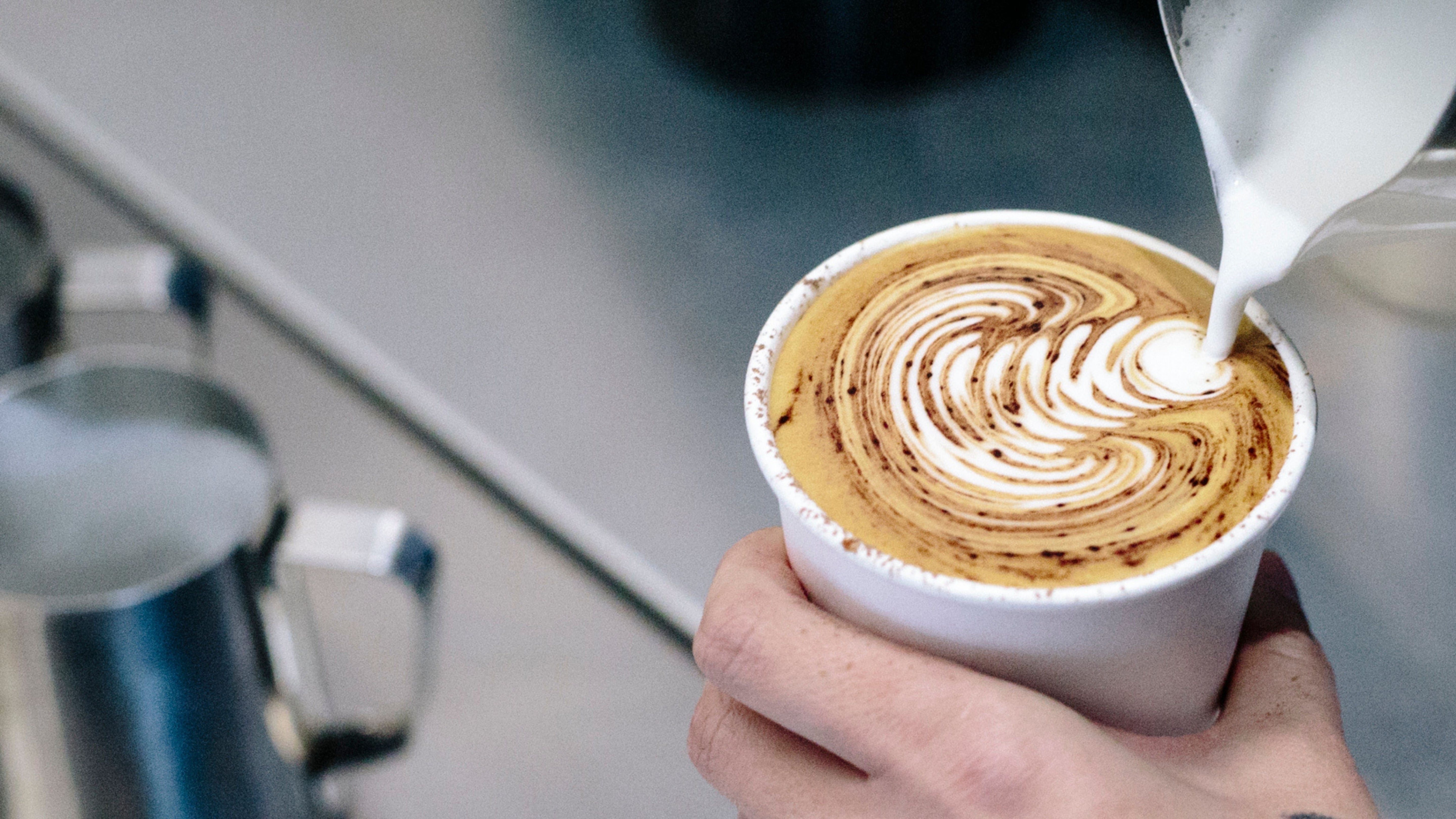 Coffee art poured at activation event
