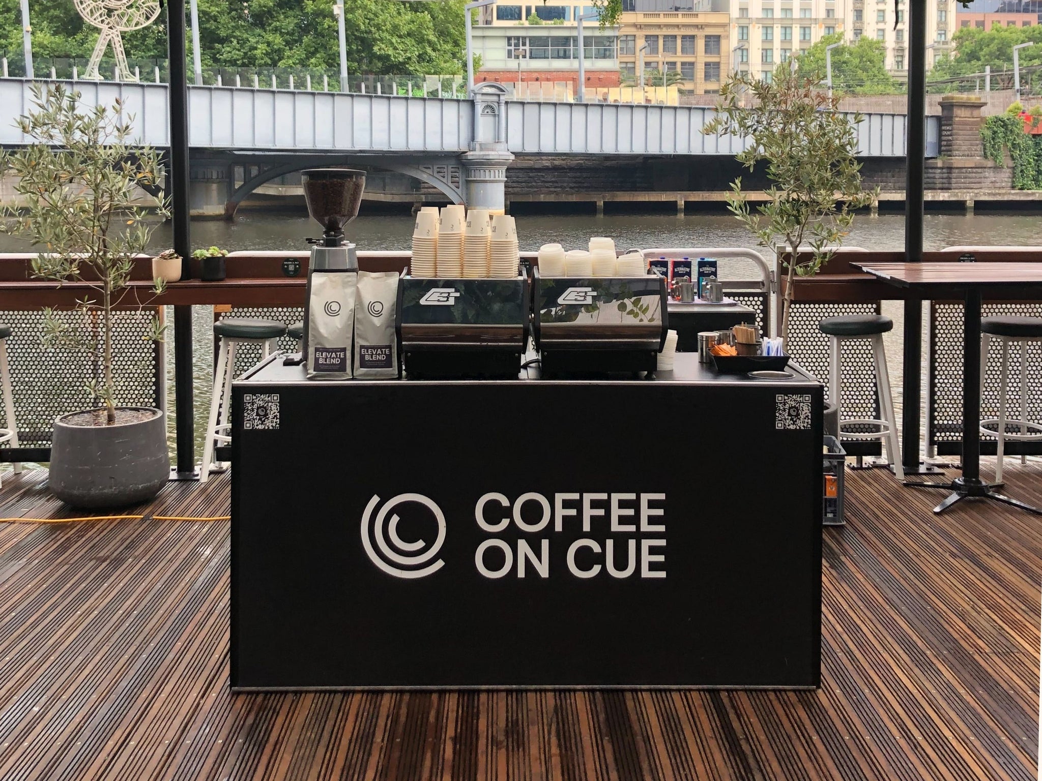 Coffee on Cue branded coffee cart set up outdoors in Melbourne