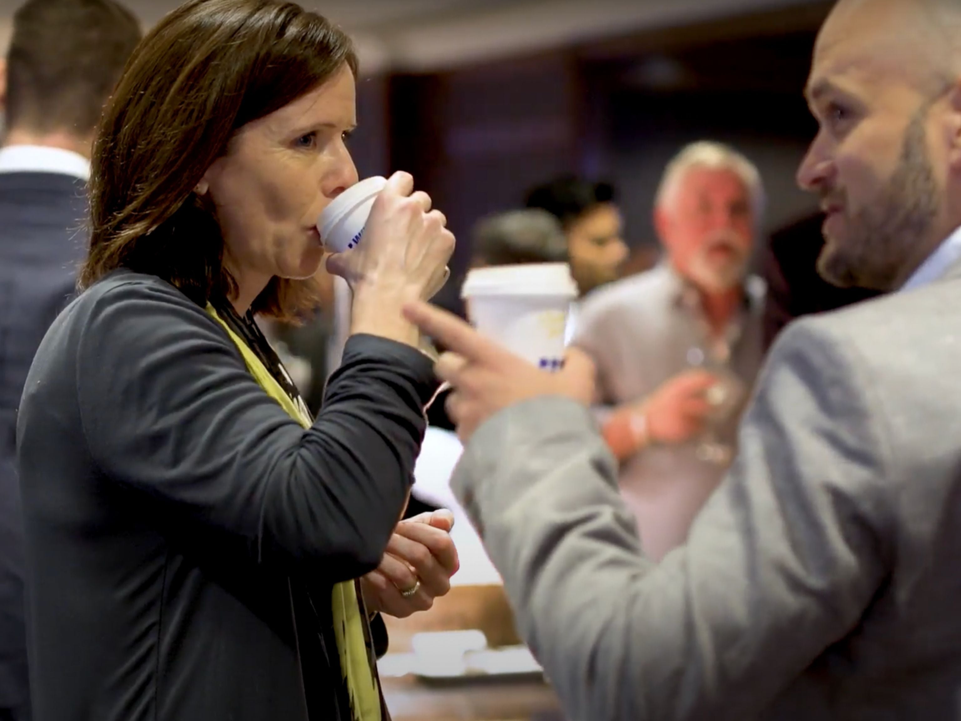 Conference guests drinking coffee