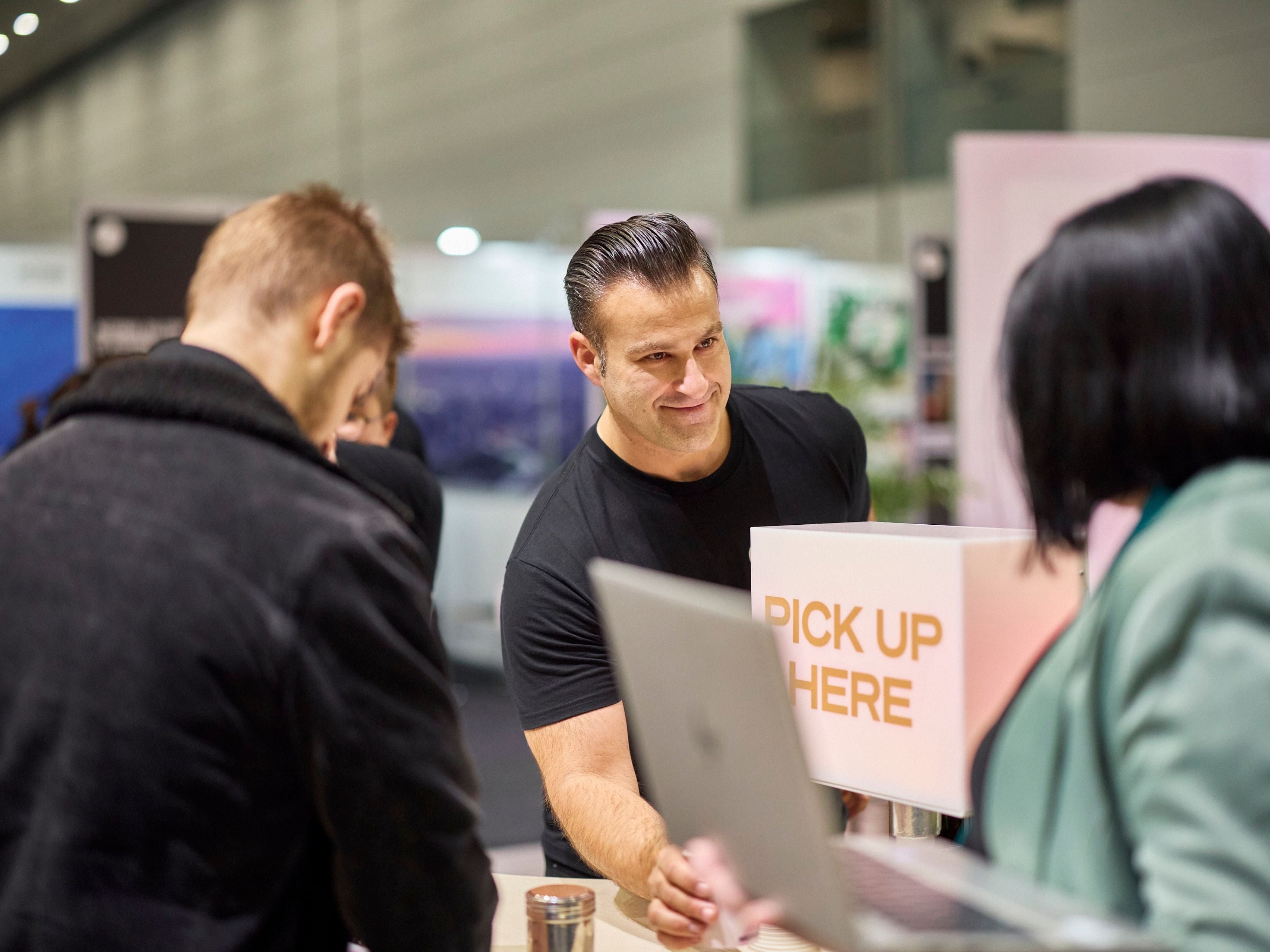 Tradestand barista serving delegate
