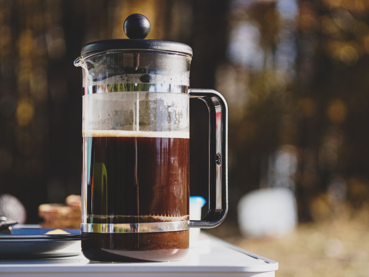 French press full of brewed coffee