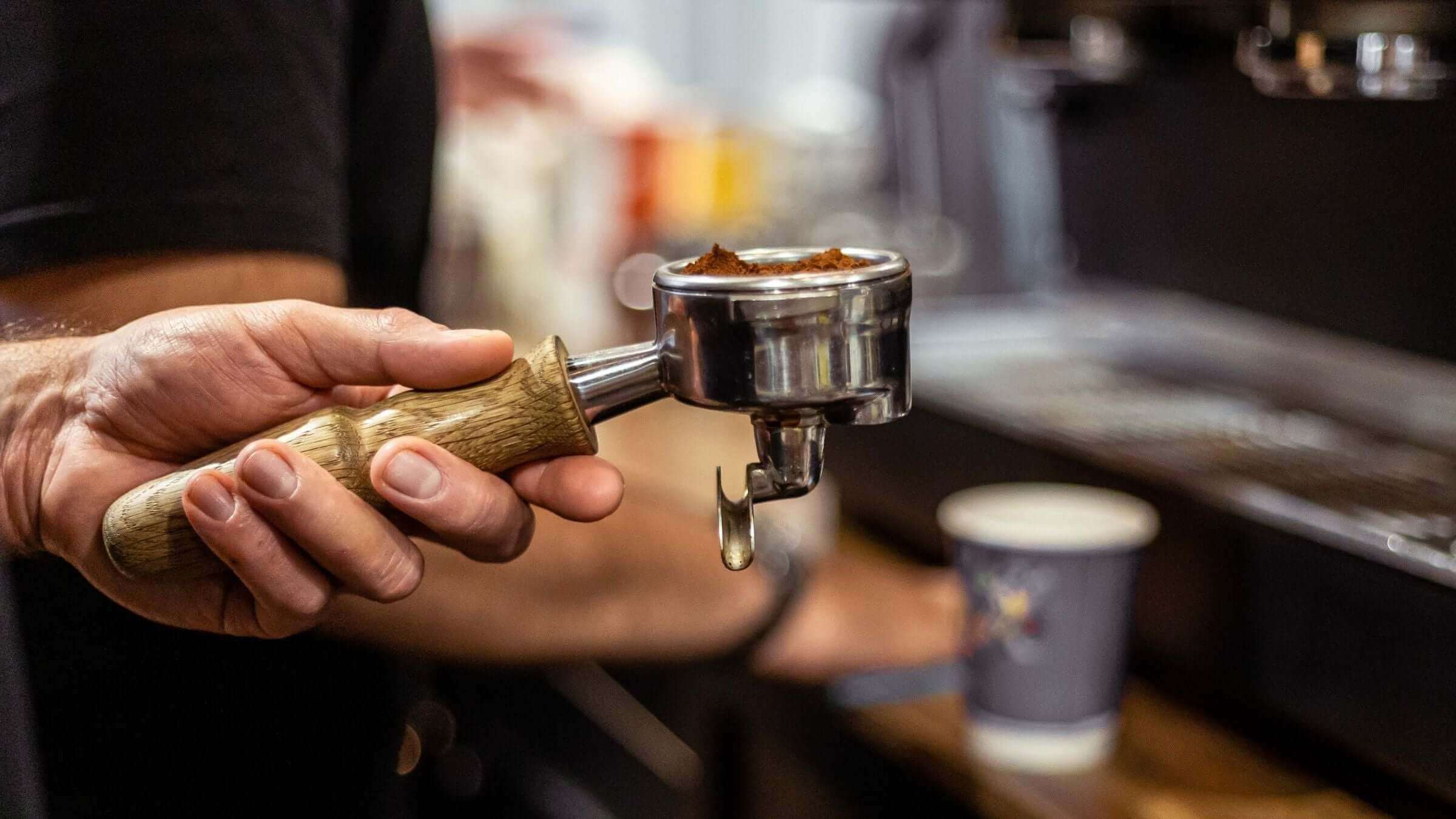 Ground coffee inside of espresso portafilter