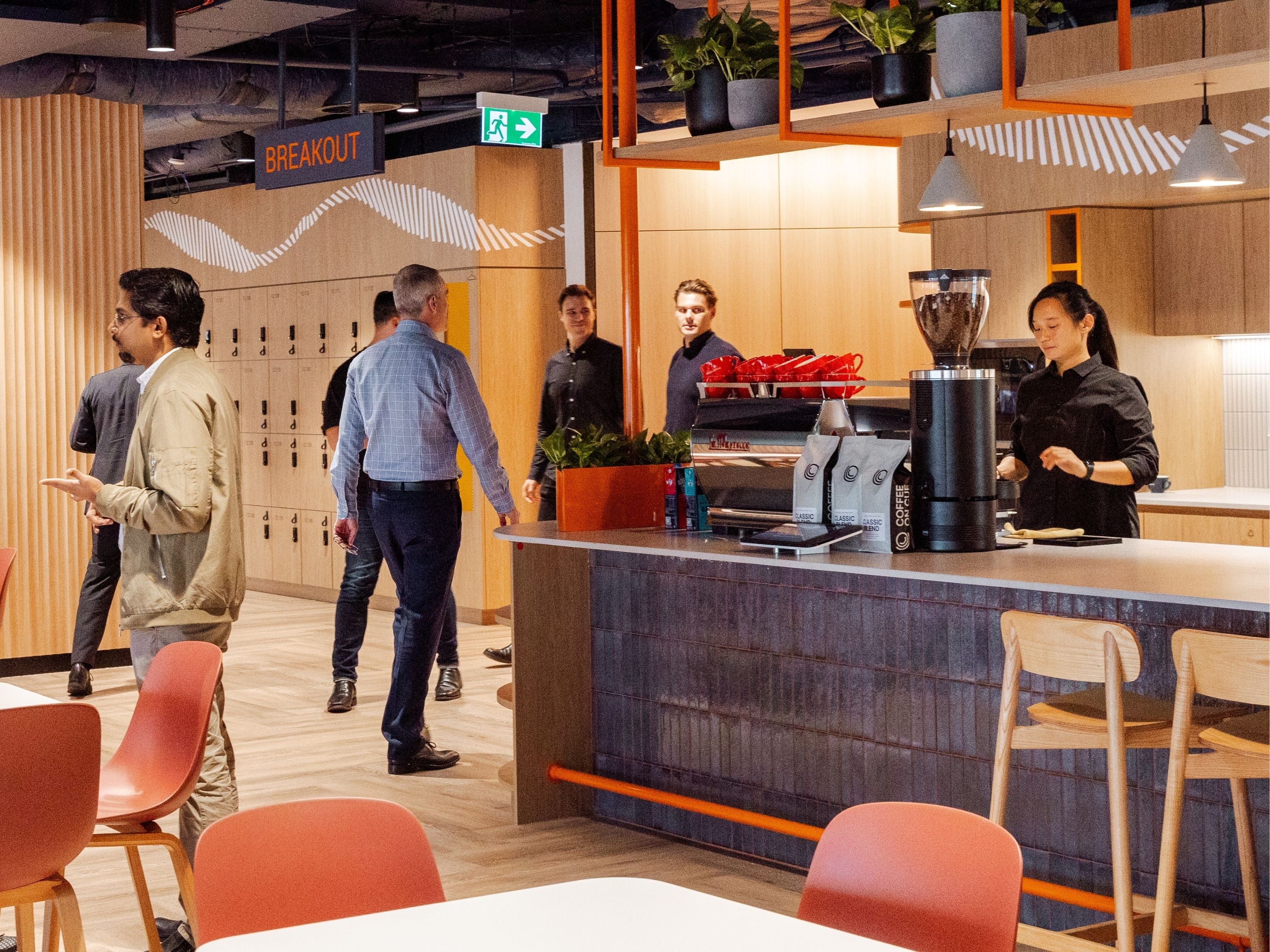 Cuscal in-house cafe and barista making coffee
